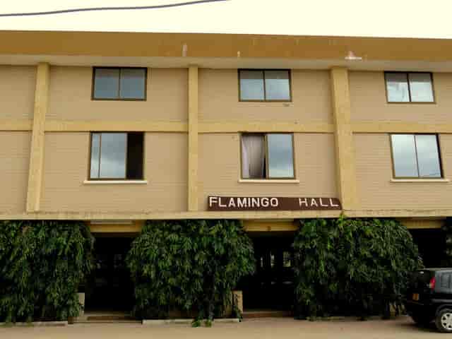 Dated Flamingo Hall interior: challenging event venue space for professional meetings.