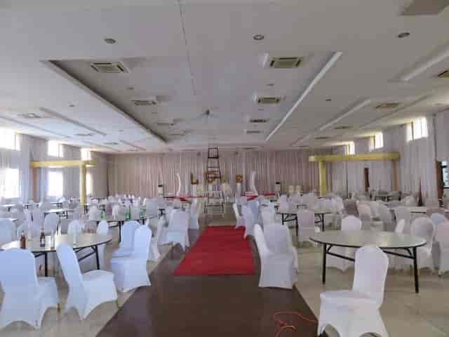Flamingo Hall banquet room setup with tall ladder, ideal for event planning and venue hire.