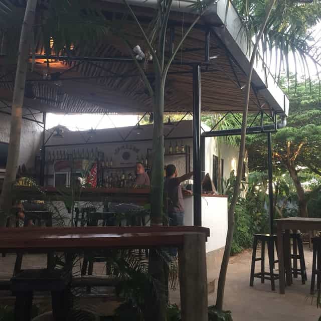 Open-air bar at The Slow Leopard for casual corporate mixer and team breakout sessions.