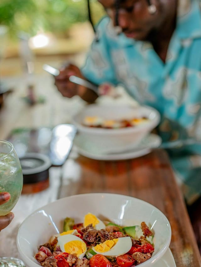 Casual networking lunch at The Slow Leopard featuring engaged attendees in a relaxed setting.