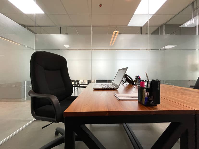 ZO Premium breakout room with frosted glass privacy for productive business meetings.