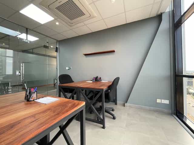 ZO Premium huddle room for one-on-one meetings, ideal for private workspaces and business events.
