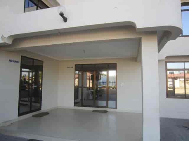 FQ Hotels conference hall entrance lacking branding and accessibility for corporate events.