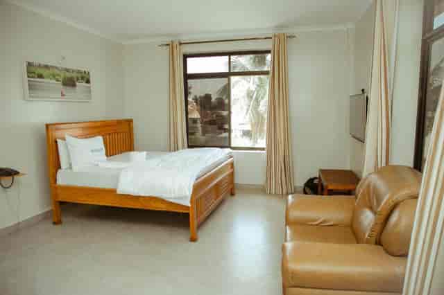 FQ Hotels standard conference room with natural light for corporate meetings and event bookings.