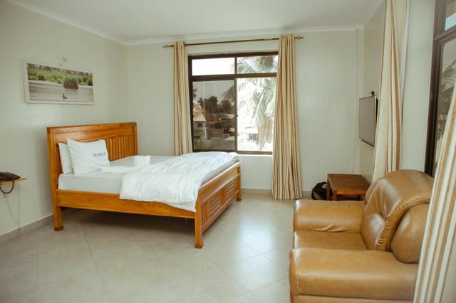 FQ Hotels standard conference room with natural light for corporate meetings and event bookings.