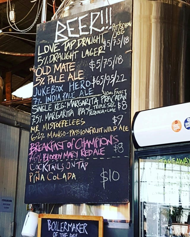 Moon Dog Craft Brewery chalkboard menu for casual networking and post-conference reception events.