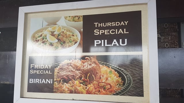 Restaurant terrace lounge signage for efficient menu display and catering service.