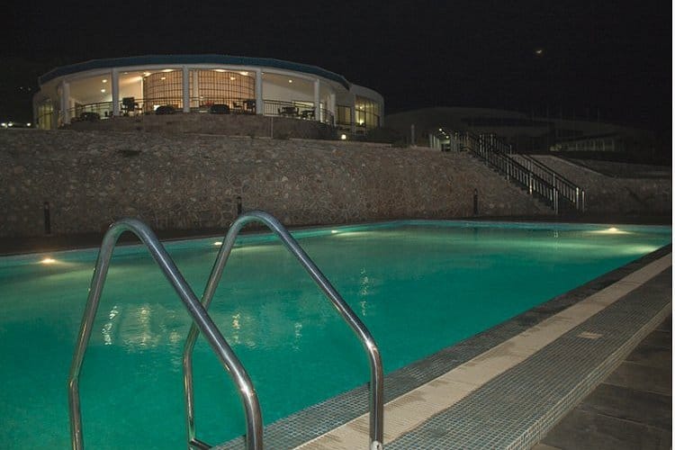 Scenic pool deck at APC Hotel for upscale corporate networking and evening reception events.