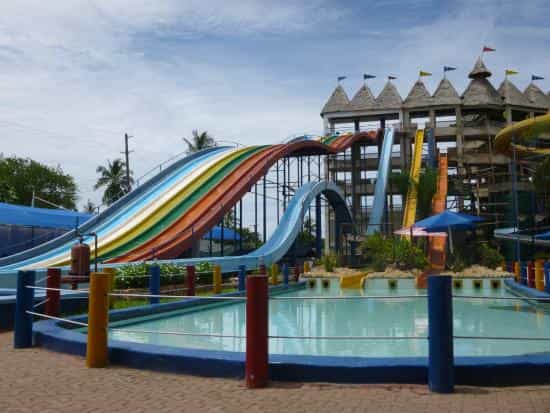 Corporate team building at Kunduchi Wet 'N' Wild water park with large water slides.