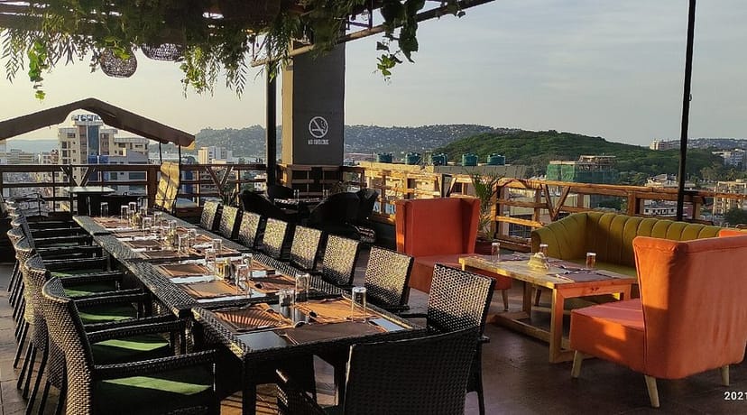 Rooftop patio with lounge seating for casual networking and corporate dinner events.