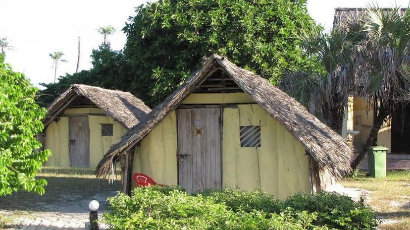 Beach huts at Kipepeo Village, rustic lodging for corporate retreat or team building events.