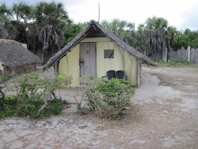 Kipepeo Beach Village huts, inaccessible rustic structures, ideal for adventurous event venues.