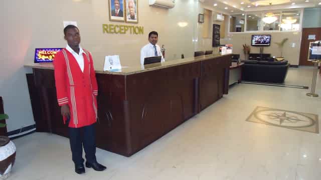 Mirch Masala Restaurant hotel reception desk for event check-in and guest registration services.