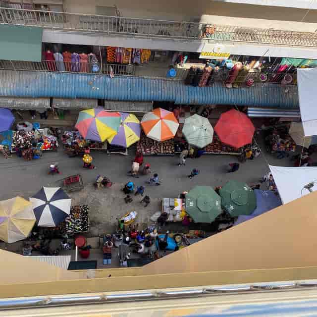 Wanyama Hotel Kariakoo: Modular stalls at a high-density, organic foot traffic vendor activation.