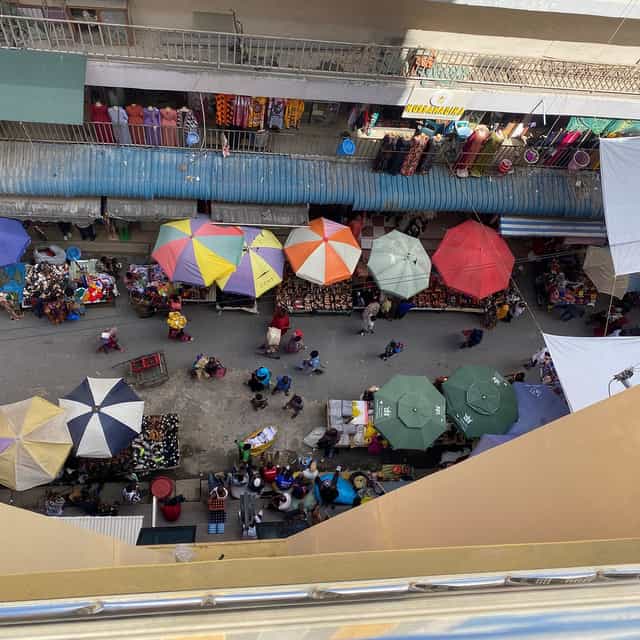 Wanyama Hotel Kariakoo: Modular stalls at a high-density, organic foot traffic vendor activation.