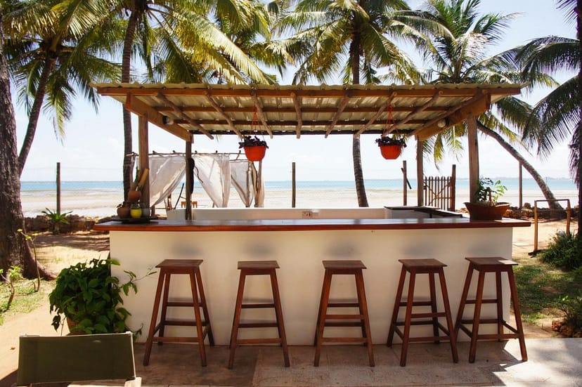 Beachfront bar in Upepo Garden, ideal for networking and sunset cocktail reception event spaces.