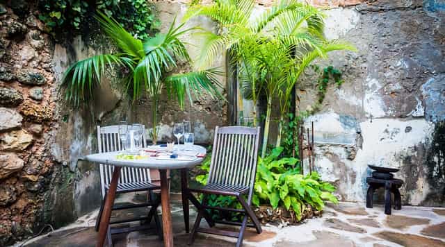 Rustic VIP dining nook in Secret Garden Restaurant for private events and intimate dinners.