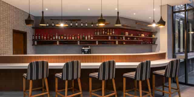 Modern Sundowner Pool Bar at Crowne Plaza Dar Es Salaam for networking and VIP receptions.