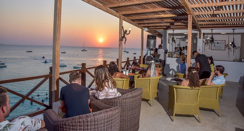 Rooftop restaurant venue for corporate events and sunset reception with lounge seating.