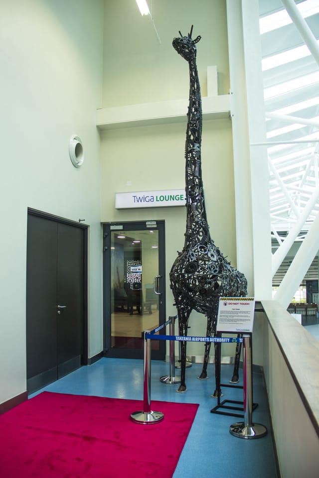 Oversized metal giraffe sculpture in Twiga Lounge, ideal for event space or corporate venue rental.