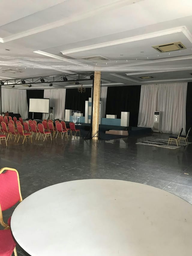 Twiga Lounge banquet hall with obstructive center column, corporate event space layout.
