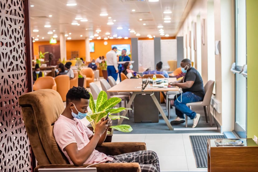 Modern co-working lounge with productive workspaces for hybrid office and corporate events.