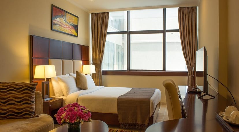 Millennium Towers Dar es Salaam hotel room with workspace for corporate conference lodging.