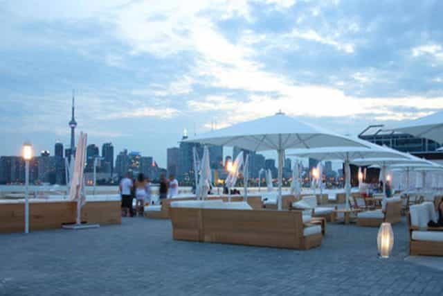 Lounge at Cabana Toronto rooftop venue with city skyline view for corporate networking events.