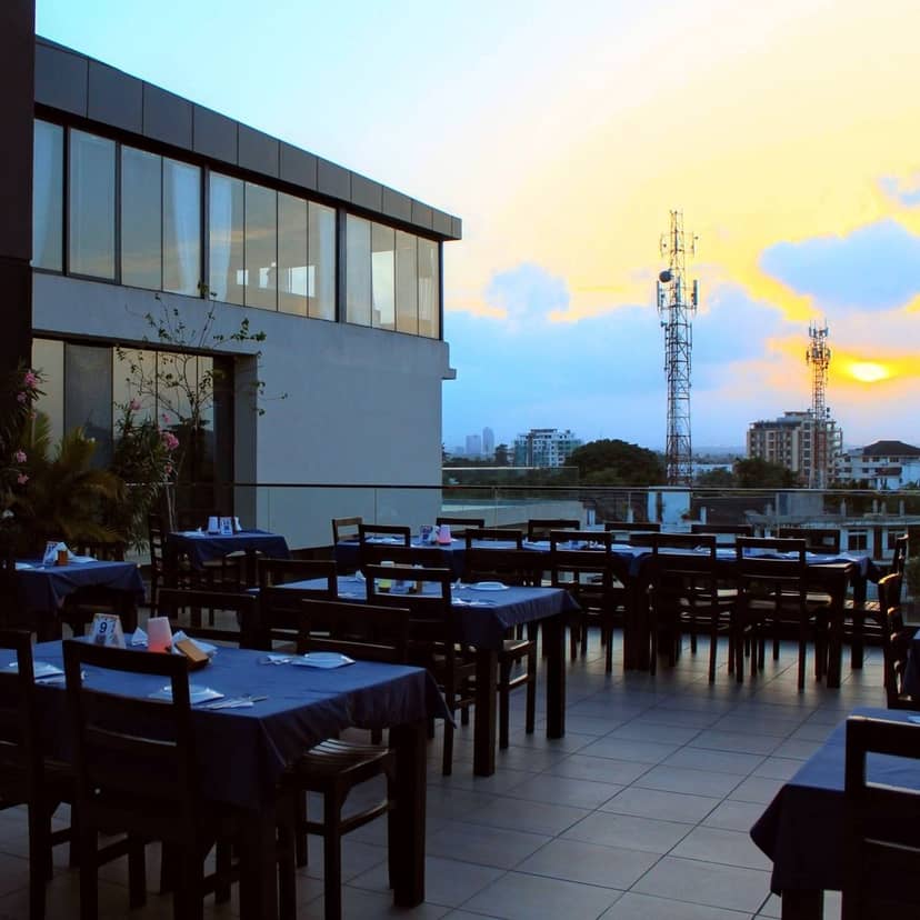 Rooftop restaurant venue for corporate mixers and sunset dinners at Nino’s Tanzania.