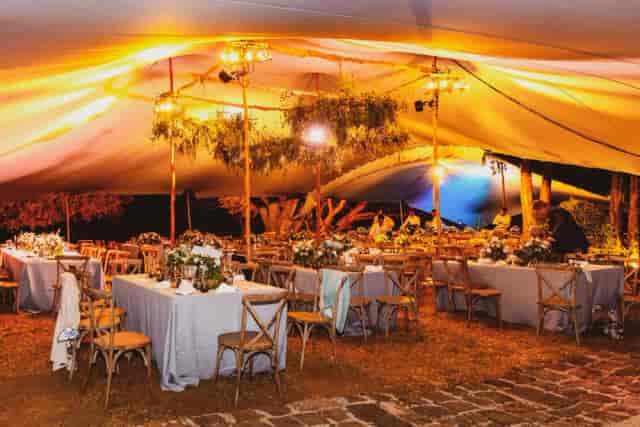 Outdoor marquee setup at Le Pavillon de Case Noyale with elegant lighting for luxury weddings.