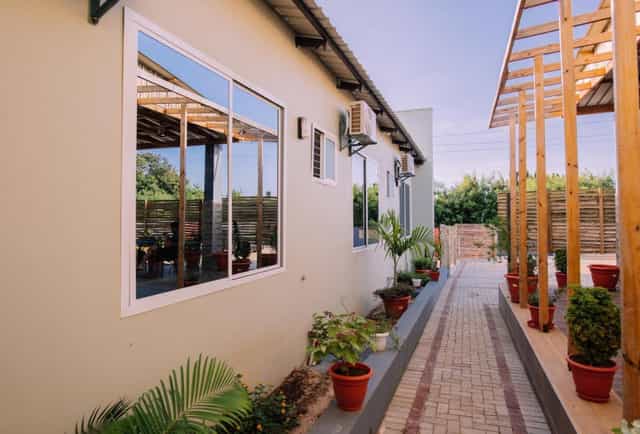 Abantu Hotel bar: intimate, modular greenery breakout space for networking and corporate meetings.