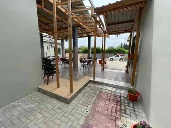 Covered outdoor restaurant at Abantu Hotel for networking and corporate catering events.