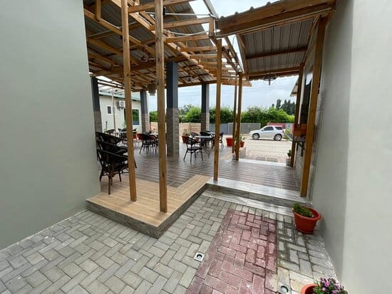 Covered outdoor restaurant at Abantu Hotel for networking and corporate catering events.
