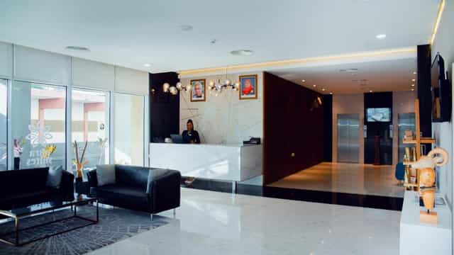 Professional conference hall at Aura Suites for corporate events and business meetings.