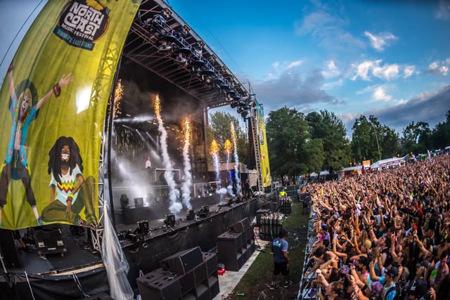 North Coast Music Festival stage with pyrotechnics for live music event activation.