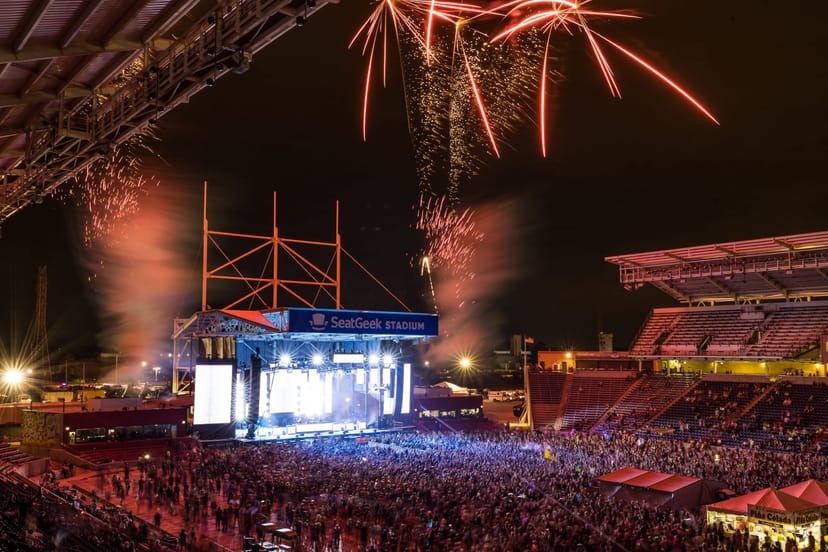 North Coast Music Festival stadium stage with pyrotechnics and crowd for concert event photography.