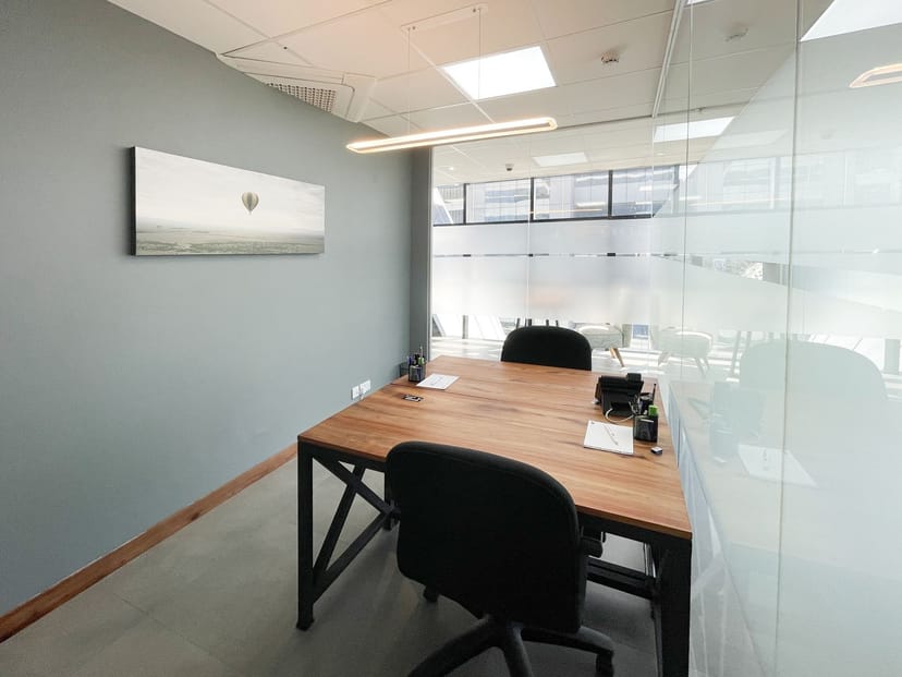 Private huddle room at WORQ Co-Working for professional breakout sessions and focused meetings.