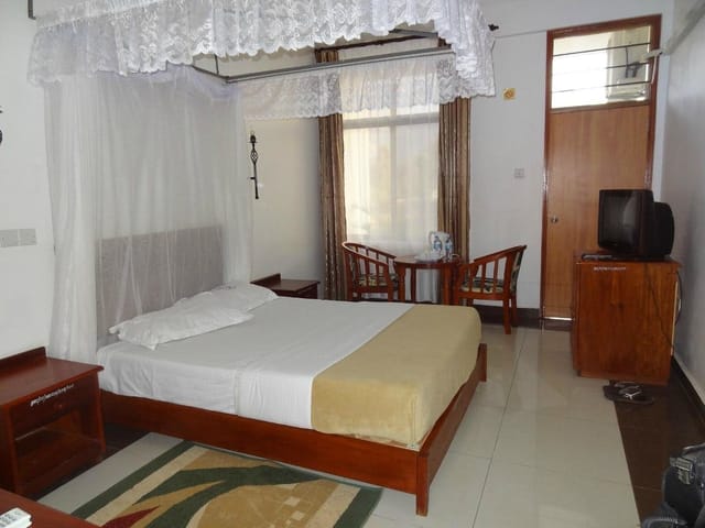 Budget Arc Hotel conference room, dated interior, ideal for affordable business meetings.