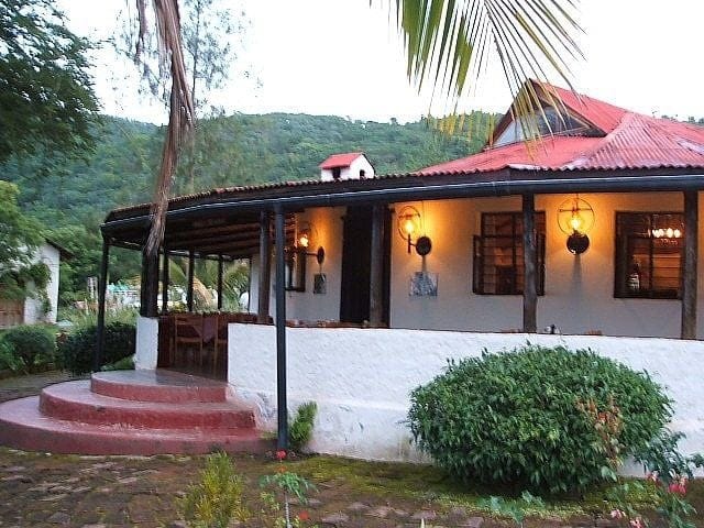 Rustic restaurant venue at Utengule Coffee Lodge for intimate team retreats and corporate meetings.