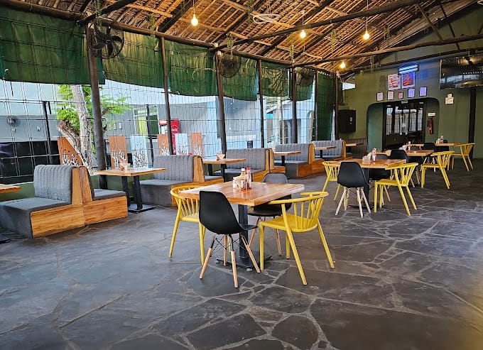 Tips Lounge outdoor area with booth seating for casual networking and team events.