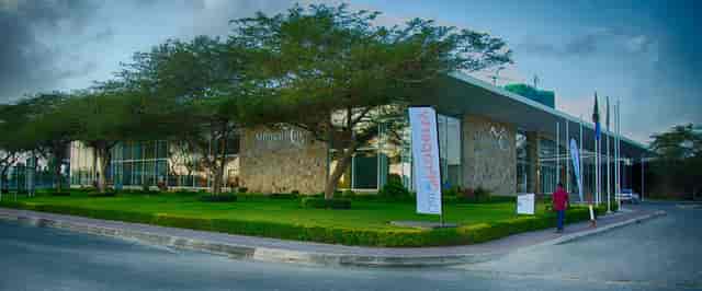 Modern glass Mlimani City conference venue for corporate events and cocktail receptions.
