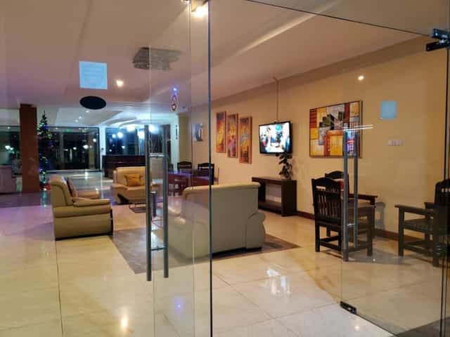 Nashera Hotels Dodoma meeting room with retro lounge seating for corporate events and workshops.