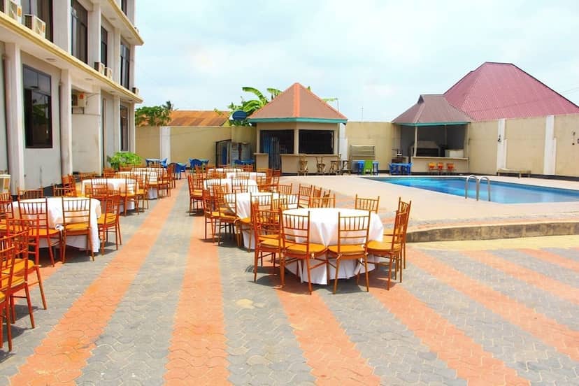 Poolside event venue at Rungwe City Hotel with Chiavari chairs for networking and cocktail parties.