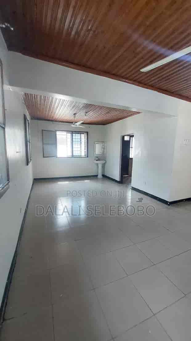 Mori Hall: Unbranded, rustic event space with exposed sink, ideal for raw pop-ups or indie exhibits.