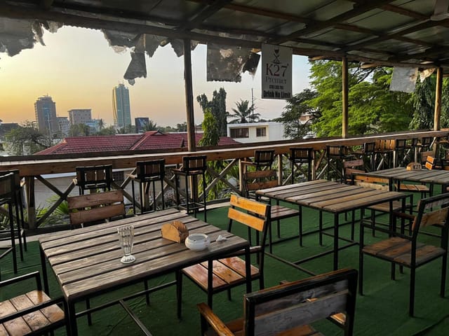 Rooftop bar at K27 Premier Inn with industrial decor for networking events and corporate mixers.