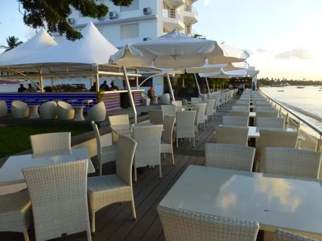 Open-air lounge with scenic sunset views, ideal for cocktail reception and corporate event venue.
