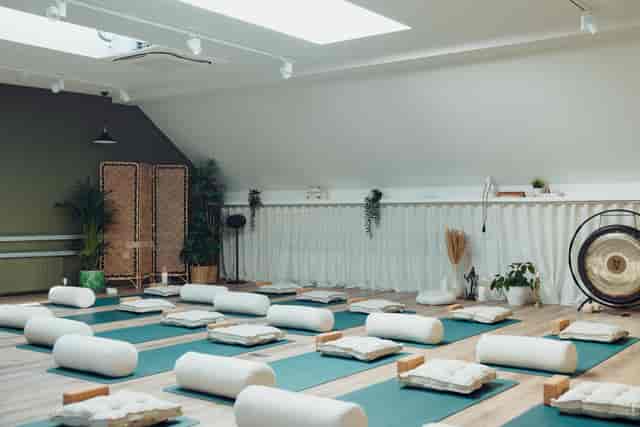 Minimalist yoga studio at The Light House for corporate wellness retreats and mindful workshops.
