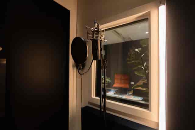 Cosy West London studio sound booth for virtual events and podcasts.