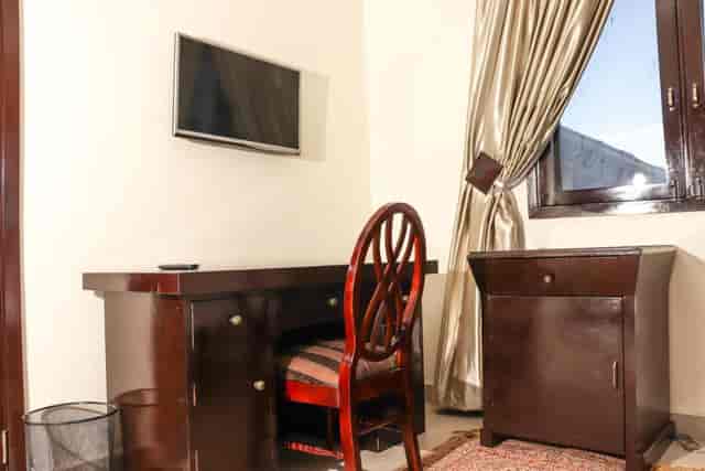 City Inn hotel room workstation for business travel or remote conference setup.