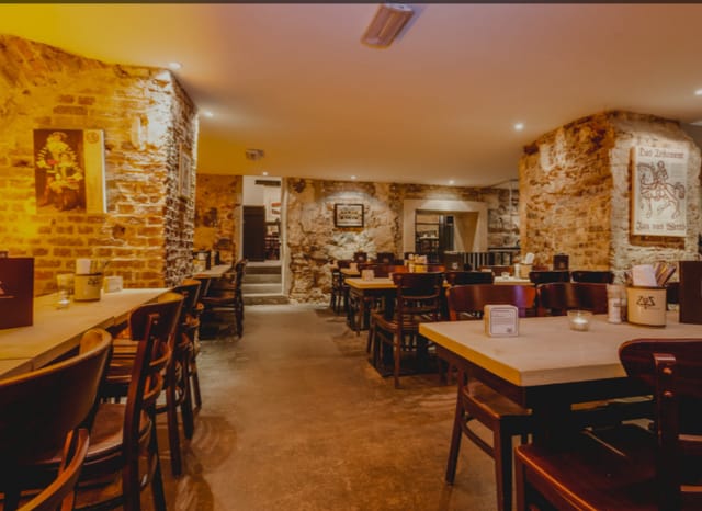 Rustic Brunnenzimmer venue at Gilden im Zims for intimate private dining and social events.